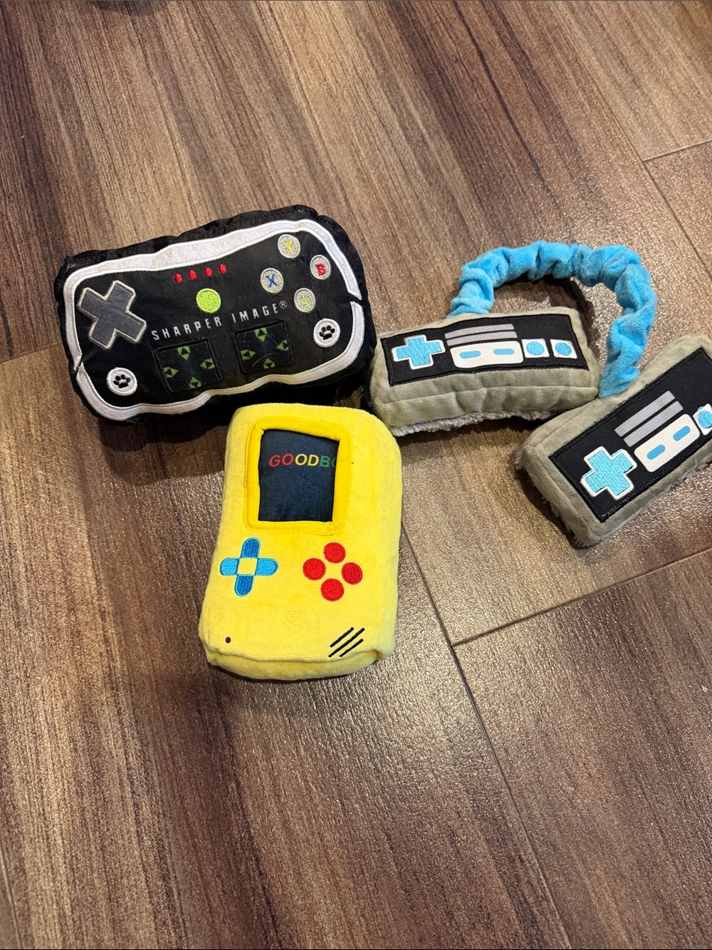 Bark Yellow Plush Handheld Game Toy with Blue and Red Button Accents